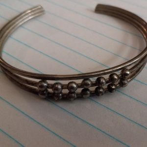 silver toned claw bracelet